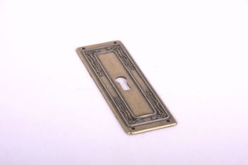 Sleutelplaat langs voor deurtjes brons antiek 33mm (zamac)